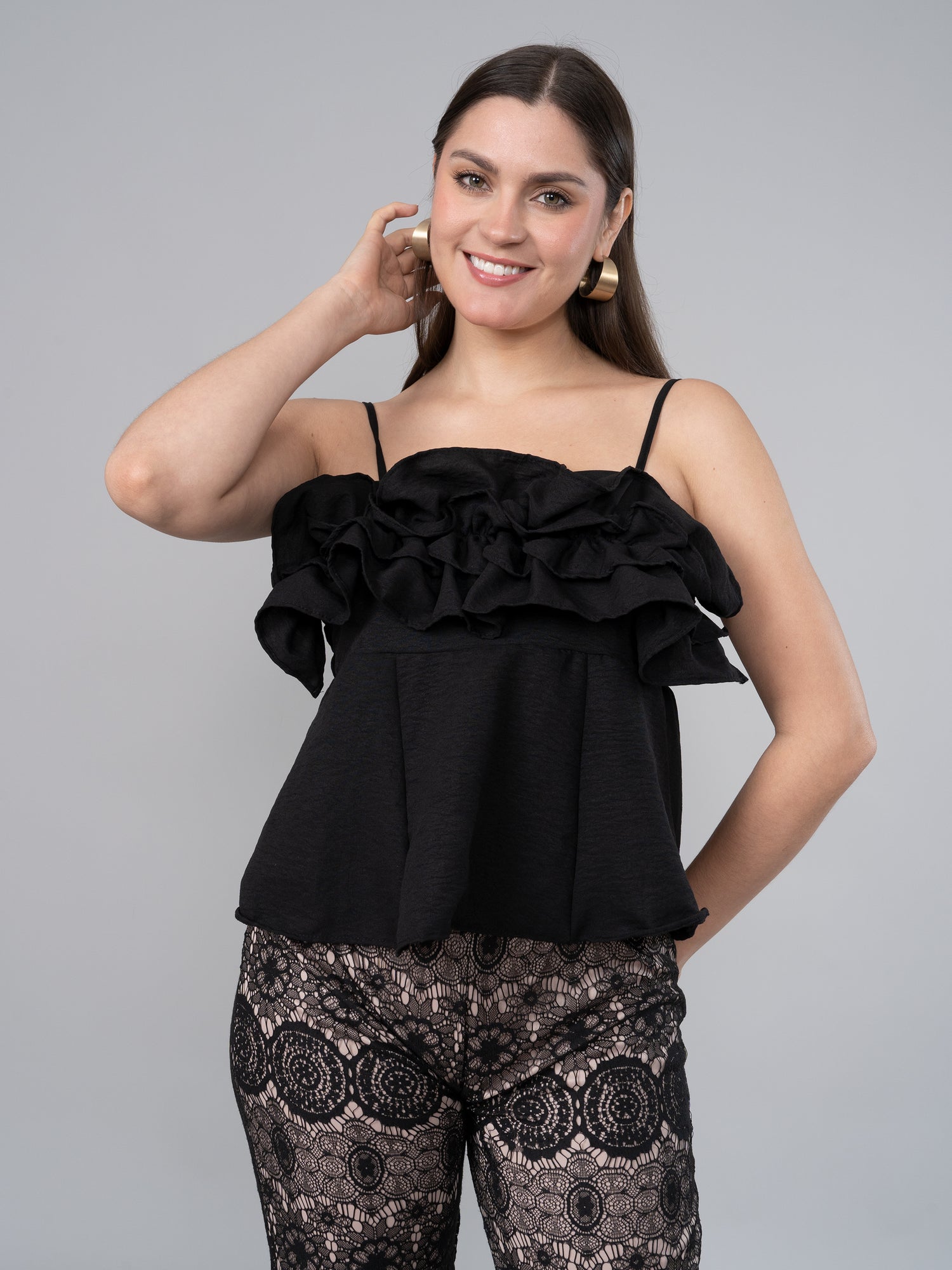 BLUSA NEGRA DE BOBOS DE MUJER 